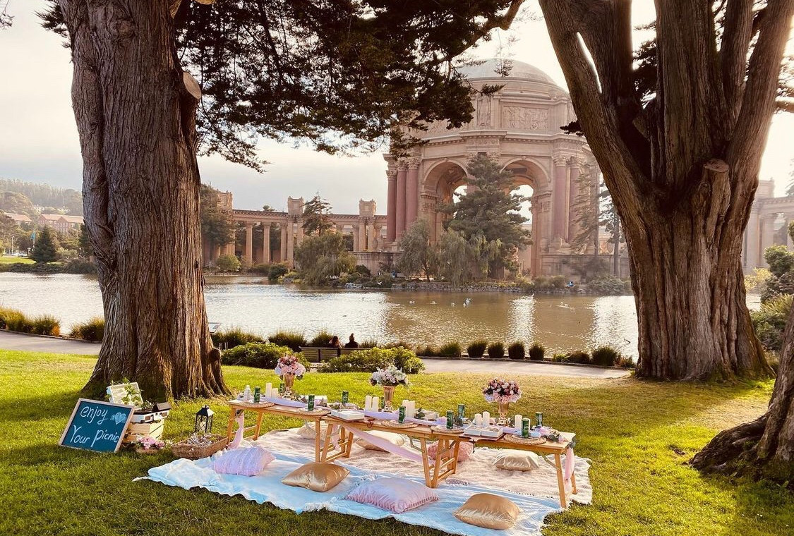 Gold and pink themed Luxury Picnic at Palace of Fine Arts, San Francisco, CA.