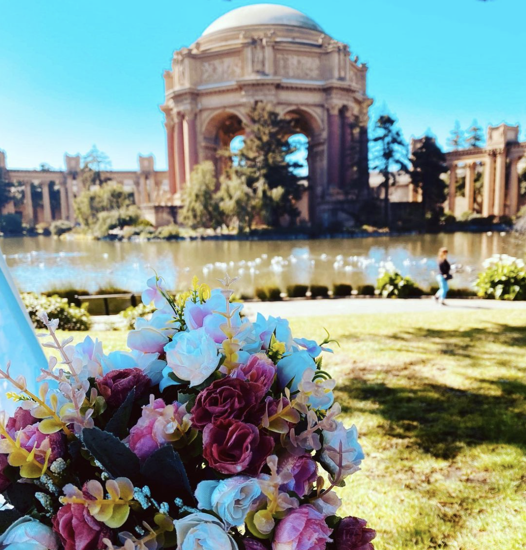 Close up of flower bouquet at a luxury picnic overlooking Palace of Fine Arts, SF Bay Area.