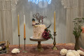 Close up of a birthday luxury picnic showcasing a stunning 30th birthday cake.