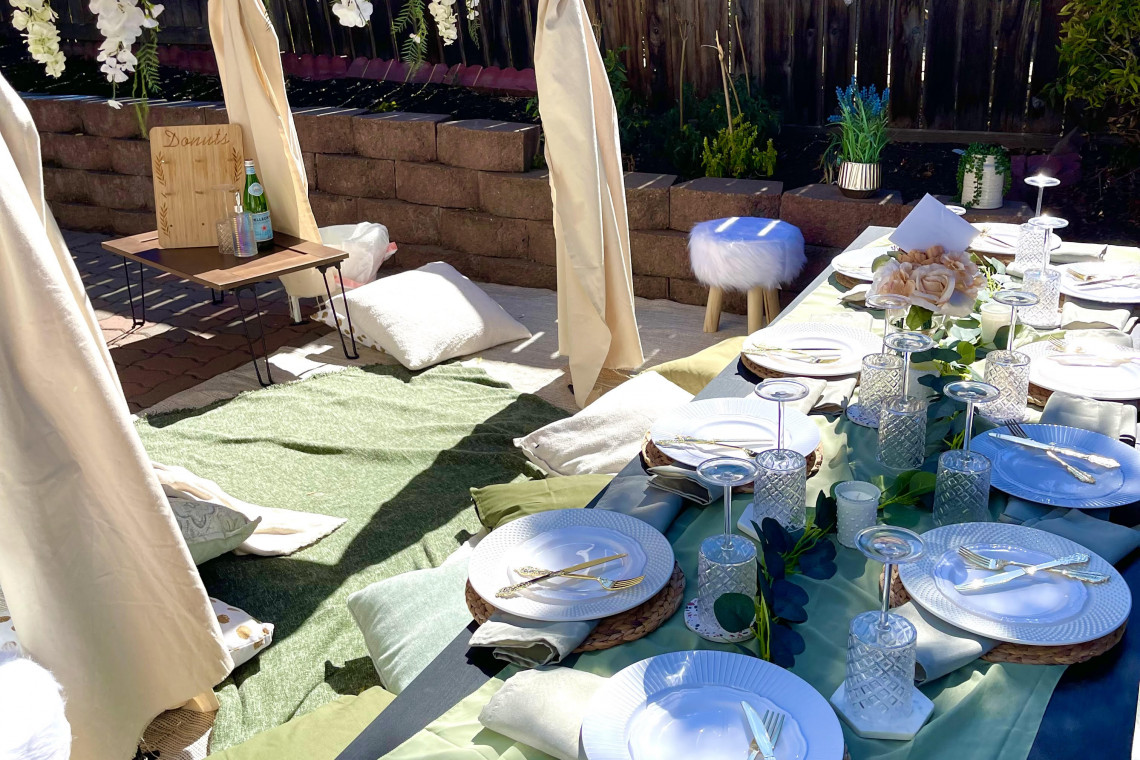 Sage picnic set up and boho canopy in SF.