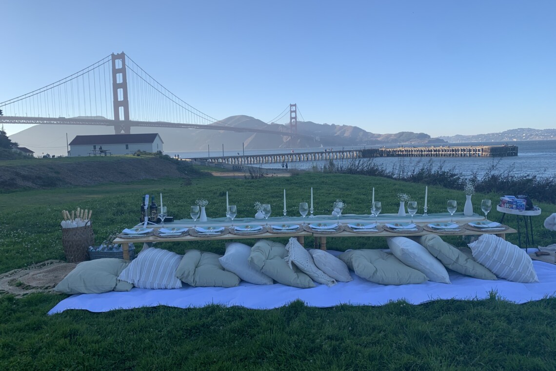 10 person luxury picnic in front of the San Francisco Golden Gate Bridge