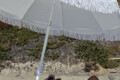 Sunbathing under a boho umbrella