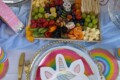 Close up of a unicorn themed plate at a luxury picnic