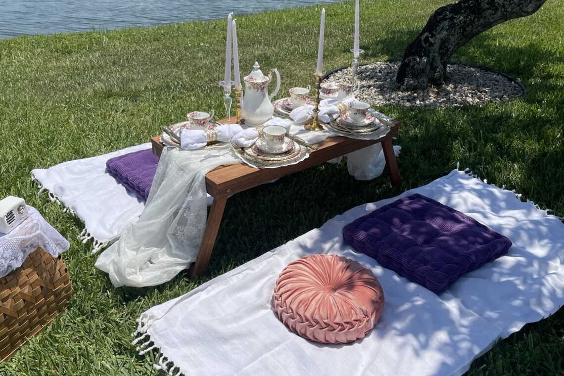 Tea party luxury picnic with lake view